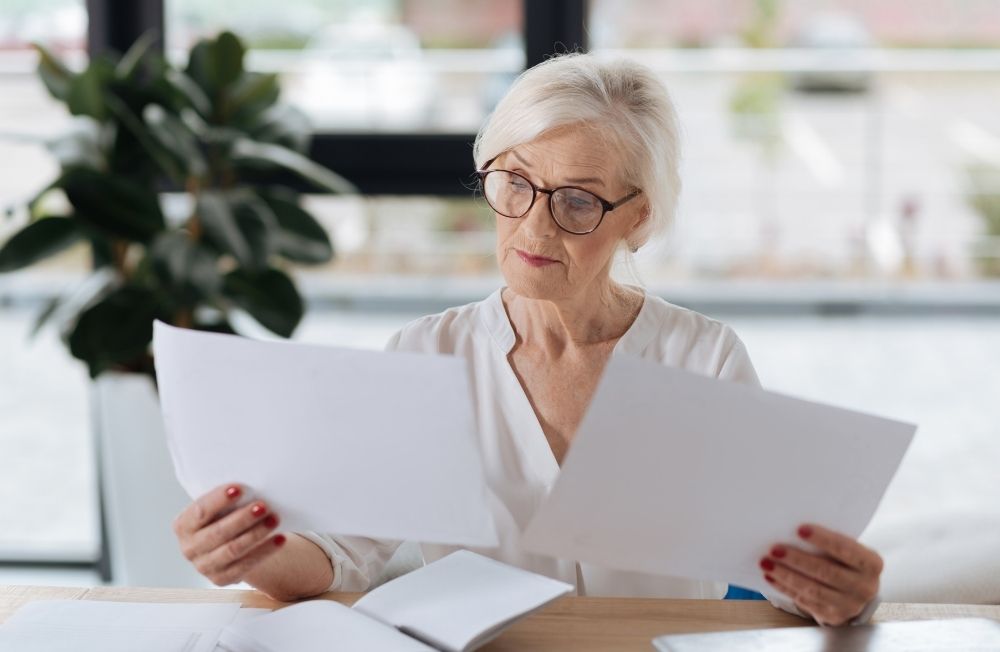 Women looking at two documents