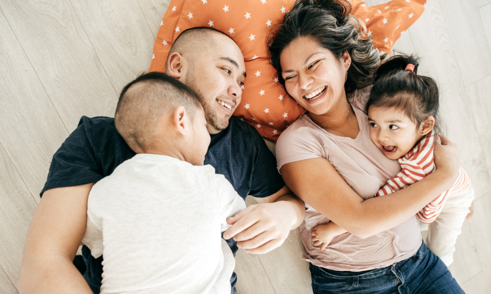 Family laying on the ground